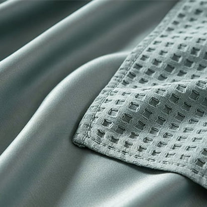 CloudWeave – Breathable Luxury Waffle Blanket